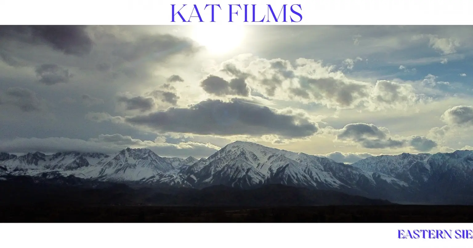 A winter range beneath breaking clouds