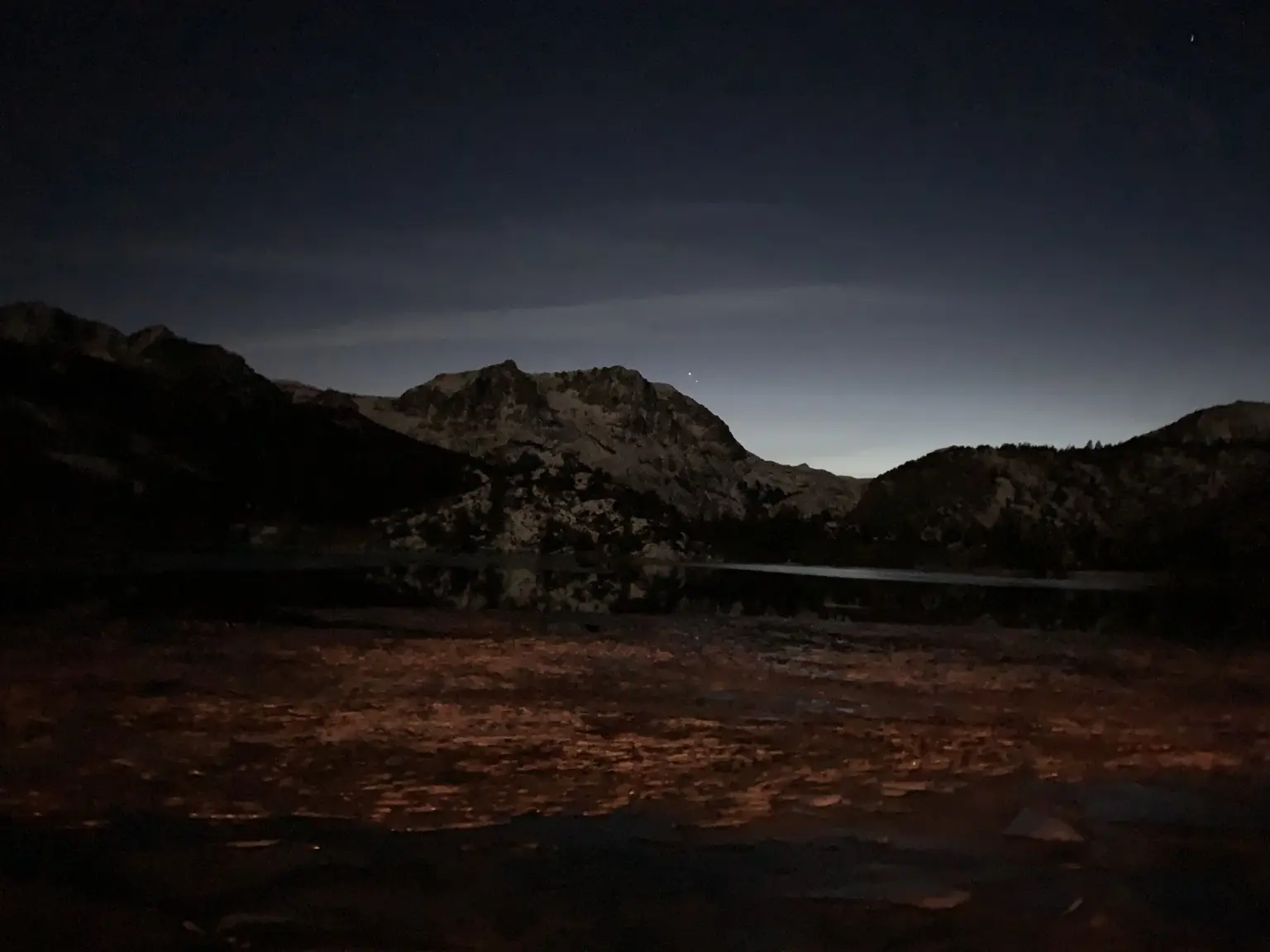 Mountain silhouette beneath the Milky Way